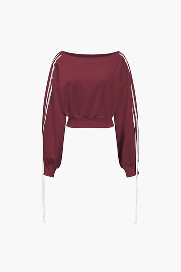 Contrasterend sweatshirt met striksluiting