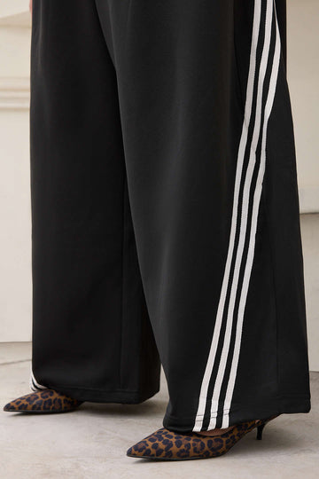 Pantalones de barril de contraste de tamaño grande