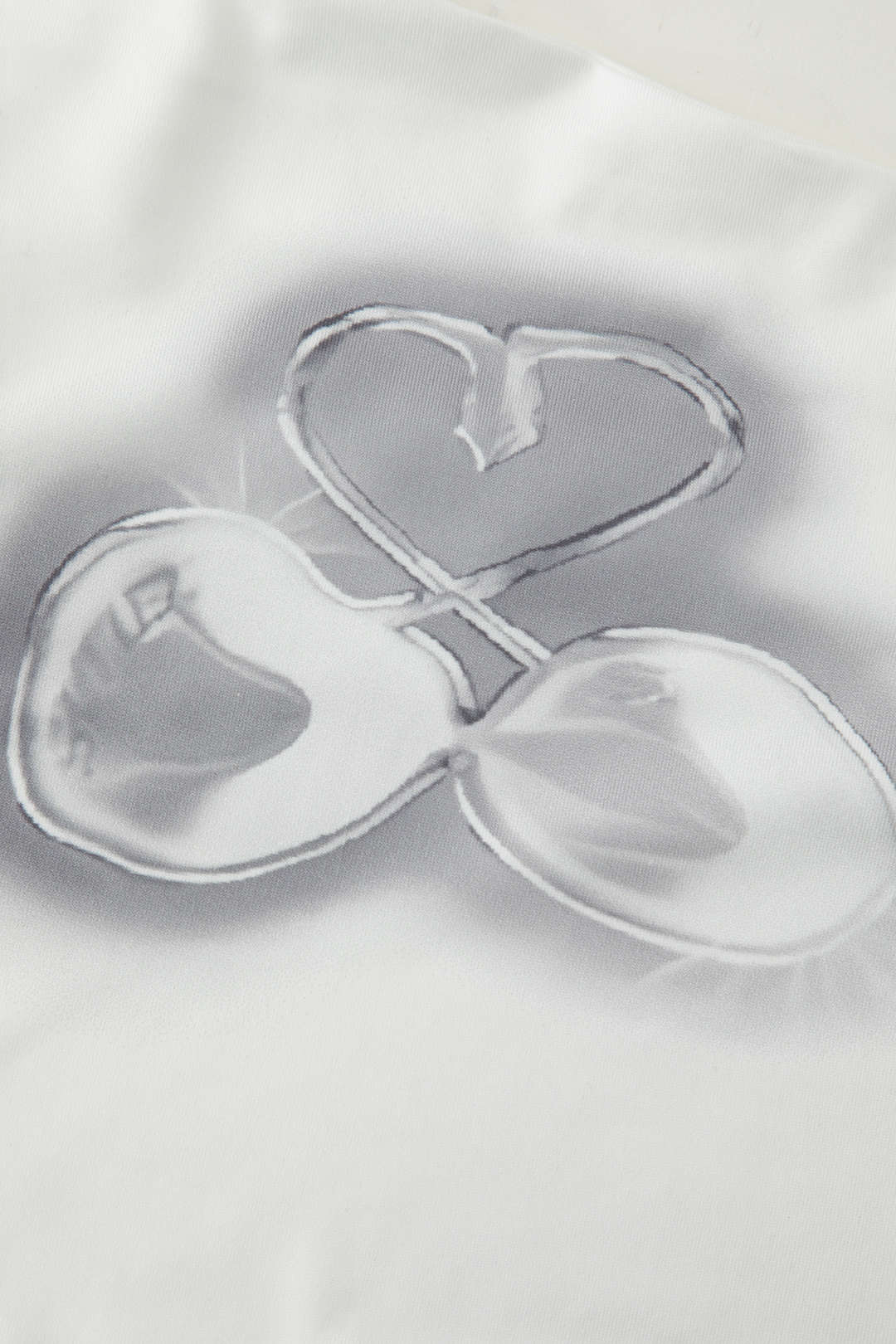 Heart Print Asymmetric Buckle Halter Top