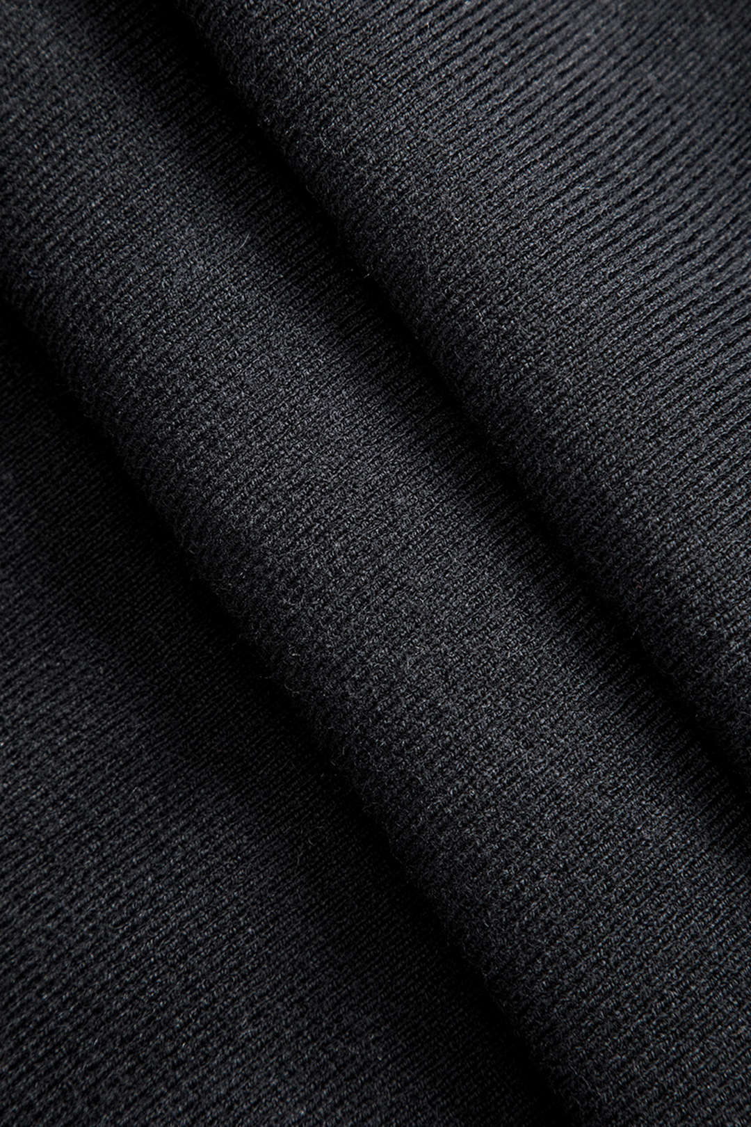 Jupe de bouton asymétrique en tricot en tricot