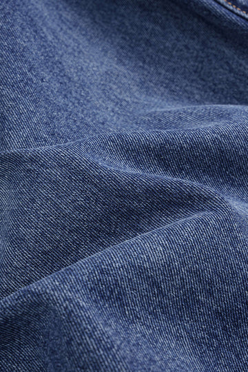 Denim Asymmetric Button Jeans