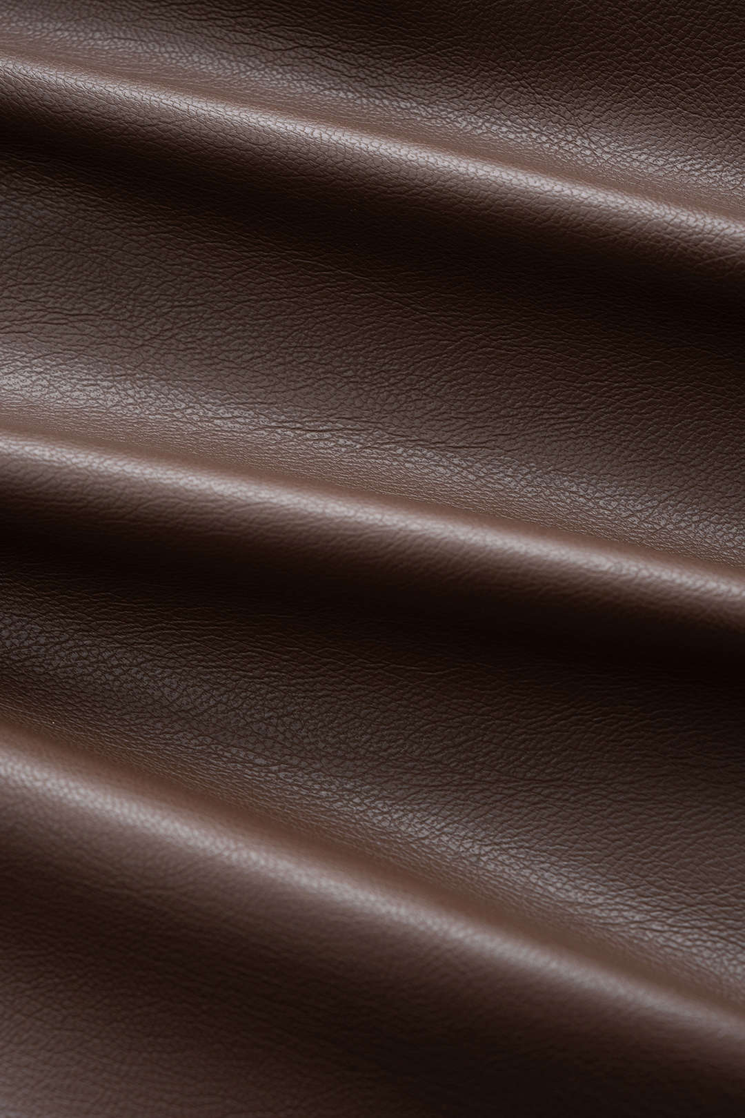 Faux Leather Patchwork Round Neck Asymmetrical Long Sleeve Bodysuit