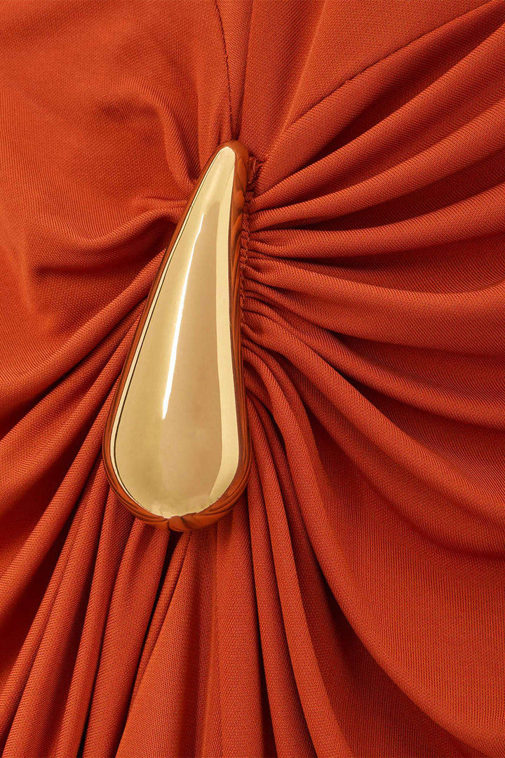 burnt orange dress with gold shoes Zendaya Gives Burnt Orange Fashion in Louis Vuitton Satin Pumps at 2025  Golden Globes