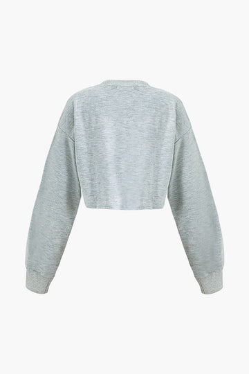 Solid Round Neck Asymmetric Crop Sweatshirt